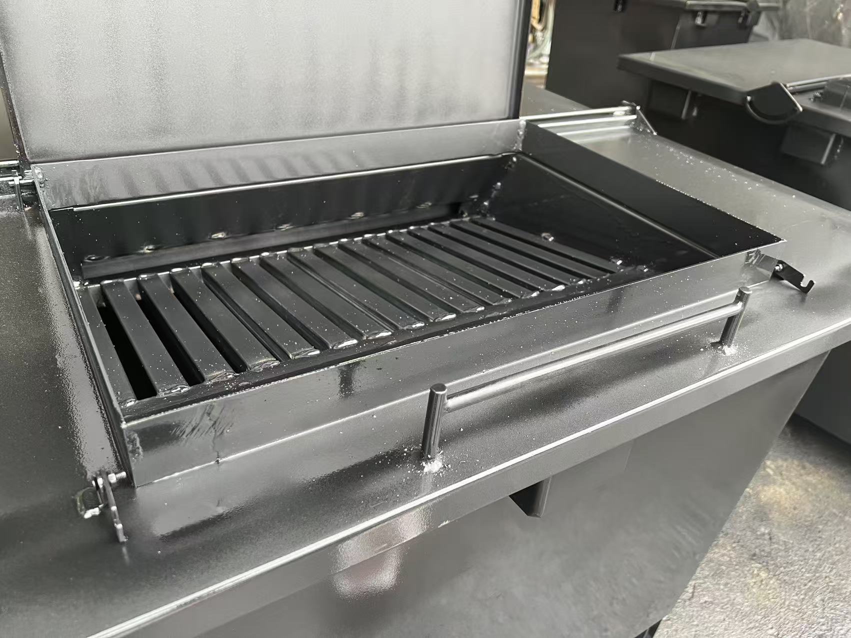 Container with lid open showing security design